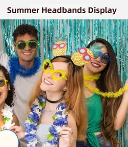 Group of friends wearing funny pineapple party headbands at a summer themed beach event