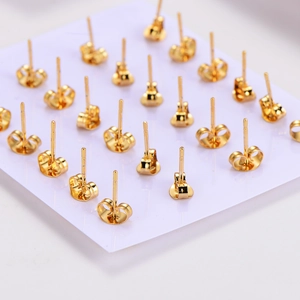 Goldene Ohrringverschlüsse aus Edelstahl in Schmetterlingsform auf Karte