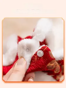 Close-up of festive red pet vest featuring snap button closure for easy dressing