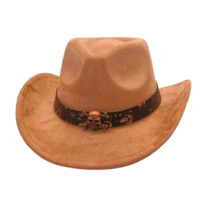 Detail of brown suede cowboy hat featuring a bronze skull emblem on the decorative band