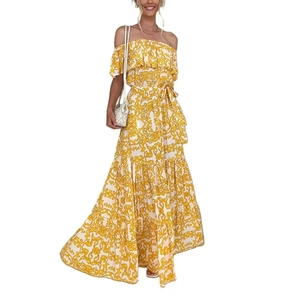 Detailed view of the yellow floral off-shoulder maxi dress with ruffled sleeves and waist tie