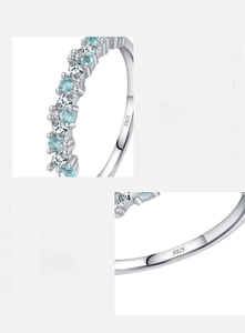 Detailed view of S925 sterling silver ring featuring blue and white zircon stones