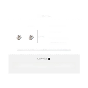 Macro detail of snowflake stud earring with zircon inlay and silver needle material specs