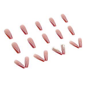 Elegant long ballerina press-on nails featuring red V-patterns and 3D rhinestone accents