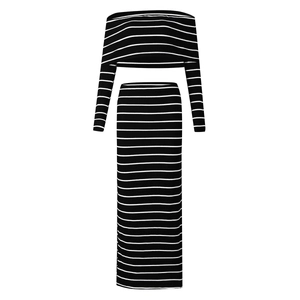 Detail of black and white striped knitted rib texture on slim off-shoulder two-piece set