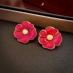 Elegant red flower stud earrings with gold textured edges and silver needles for women