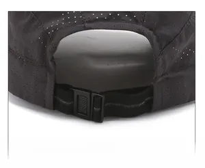 Macro view of adjustable buckle and breathable mesh on black outdoor quick-dry beret