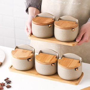 Japanese ceramic seasoning jar set with wooden lids and trays in light beige finish
