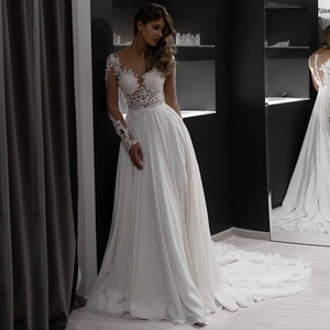 Elegant long sleeve lace wedding dress with U-neck and backless trail design