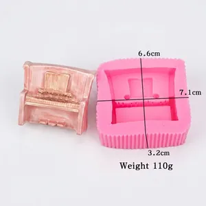 Pink piano-shaped silicone mold for fondant and chocolate with product dimensions and weight