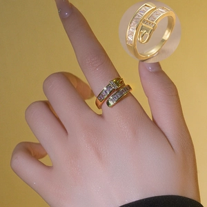 Golden belt buckle ring with sparkling rectangular crystals for a trendy luxury look