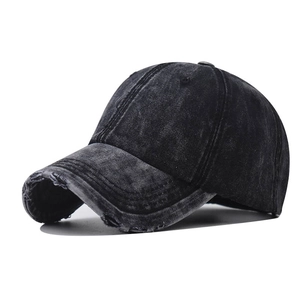 Unisex vintage washed denim baseball cap with distressed details and frayed finish