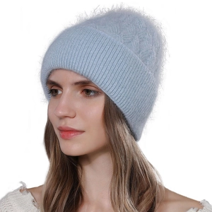 Women's light blue angora knit beanie with soft plush texture and folded cuff