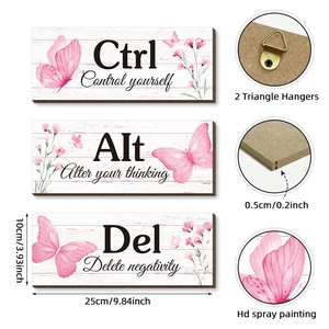 Pink butterfly wood wall art with motivational Ctrl Alt Del text and floral patterns