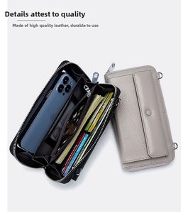 Internal view of cross-body phone wallet showing card slots and zipper compartment