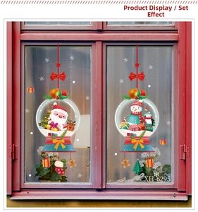 Christmas window stickers set with Santa and Snowman ornaments on red wood frame