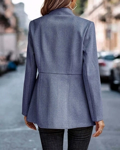 Back view of blue and white herringbone tailored blazer with a slim fit silhouette