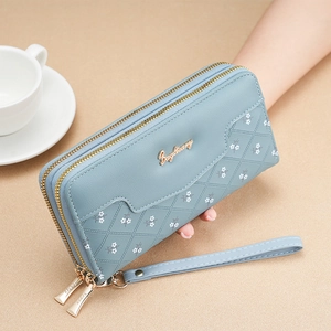 Portefeuille long bleu avec motifs floraux, double fermeture éclair et dragonne détail