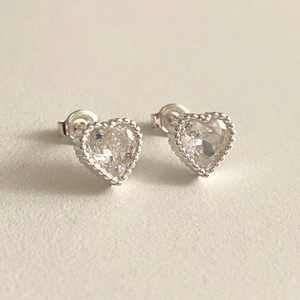 Minimalist 925 sterling silver heart stud earrings with sparkling cubic zirconia stones