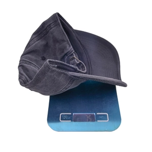 Washed cotton embroidered butterfly baseball cap weighing 75g on electronic scale