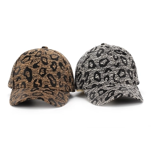 Detail of leopard print and lace mesh patterns on hard-top stylish baseball caps