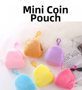Detailed view of colorful plush mini backpack coin purses with secure zipper and hooks