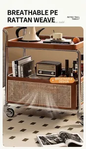 Detail of vintage trolley with PE rattan woven basket and solid wood storage tray