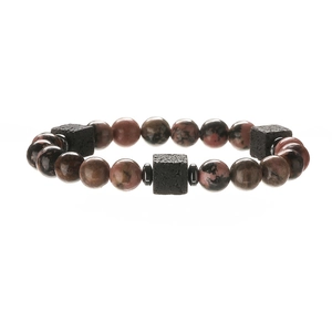 Detail of pink natural stone beads and black square lava stones on a minimalist bracelet