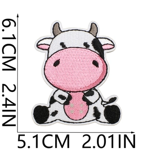 Detail view of cartoon cow embroidery patch with precise dimensions 5.1cm x 6.1cm