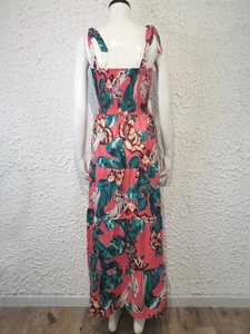 Detail of the smocked back and adjustable tie straps on this floral maxi dress