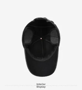 Detail of warm winter baseball cap interior showing fleece lining and foldable ear flaps