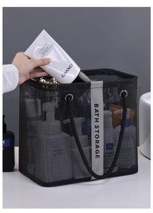 Detail of black mesh shower bag with Bath Storage handle and spacious interior