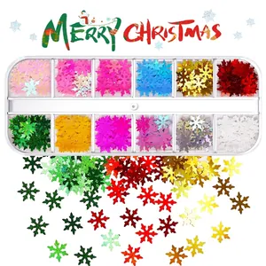 Detail of 12-grid Christmas snowflake glitter set for nail art and festive makeup