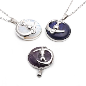 Natural crystal moon cat pendants in opal, lapis lazuli and amethyst styles