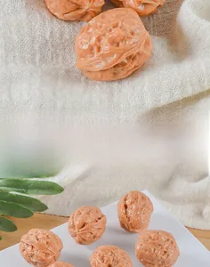 Macro view of realistic PVC walnuts showing detailed texture for hand massage