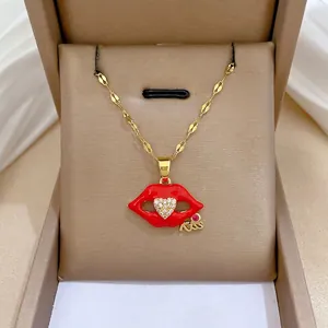 Luxurious gold-plated red lip pendant necklace with heart-shaped zircon and Kiss lettering