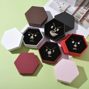 Hexagonal jewelry gift boxes in various colors with sponge inserts for rings and necklaces