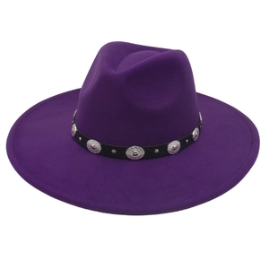 Detail of deep purple wide brim wool fedora hat with bohemian metal studded leather band