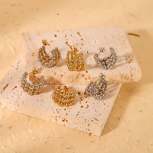 Three pairs of C-shaped 18k gold plated beaded earrings in gold, silver and mixed tones