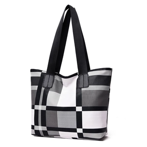 Large capacity tote bag with black and white plaid pattern and faux leather handles