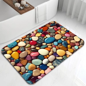 Close-up of 3D pebble pattern on absorbent diatom mud bath mat with non-slip texture