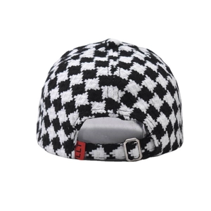 Detail of houndstooth baseball cap back with adjustable metal buckle and red LLT tag