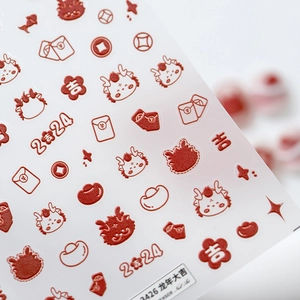 2024 Year of the Dragon themed nail stickers with red cartoon dragon and gold coin designs