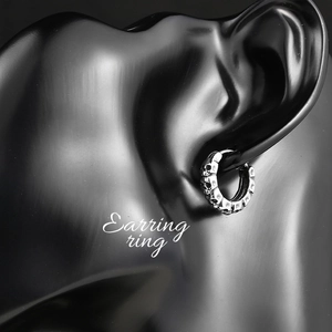 Retro punk stainless steel hoop earring with skull relief design for men street style