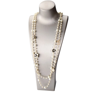 Double-layered long pearl necklace featuring camellia floral charms and crystal number 5