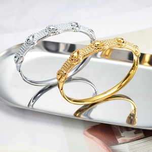 18K gold and silver plated hinged bangles with textured vintage relief design