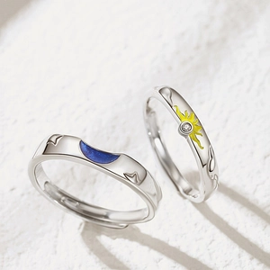 Adjustable sun and moon couple rings in silver finish with blue and yellow enamel details
