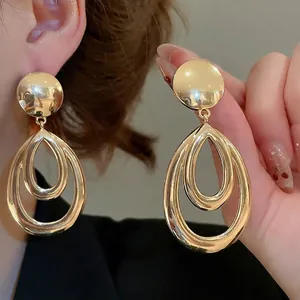 Boucles d'oreilles pendantes gouttes d'eau creuses double couche en or poli