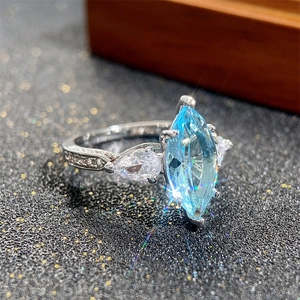 Marquise cut light blue zircon wedding ring for women in polished silver finish