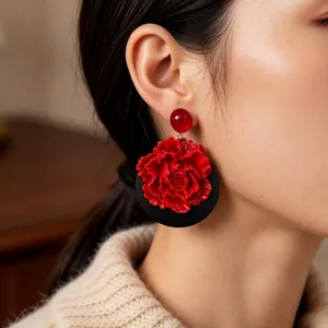 Vintage large 3D red flower pendant earrings with black round disc on model